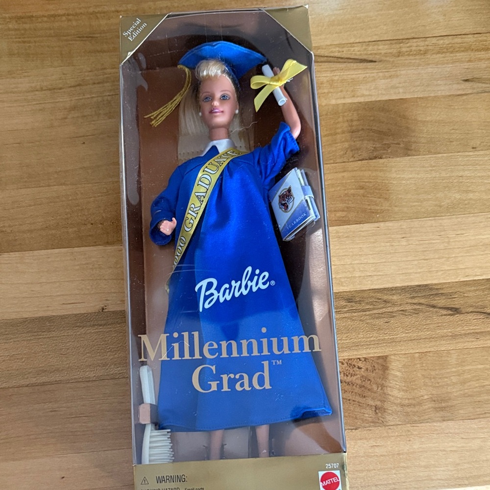 NEW in box. Barbie Millennium Grad Doll in Blue and Yellow